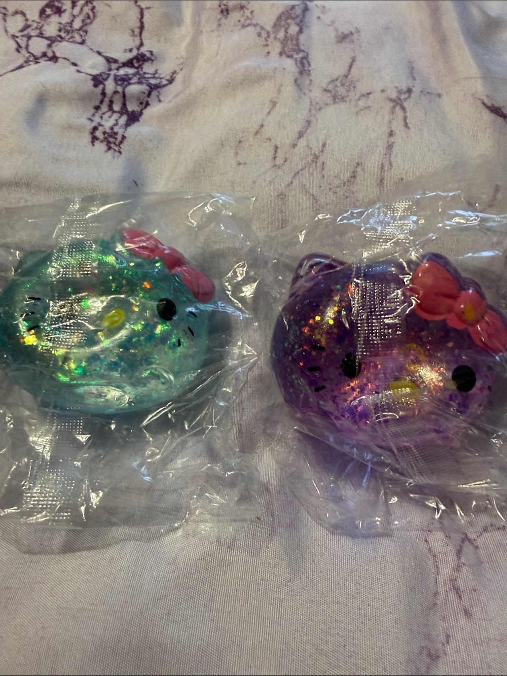 Hello Kitty Glitter Resin Face Squishies - Aqua & Purple